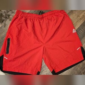 Lnwot Men's Reebok athletic shorts. Size 3X. Red and black.